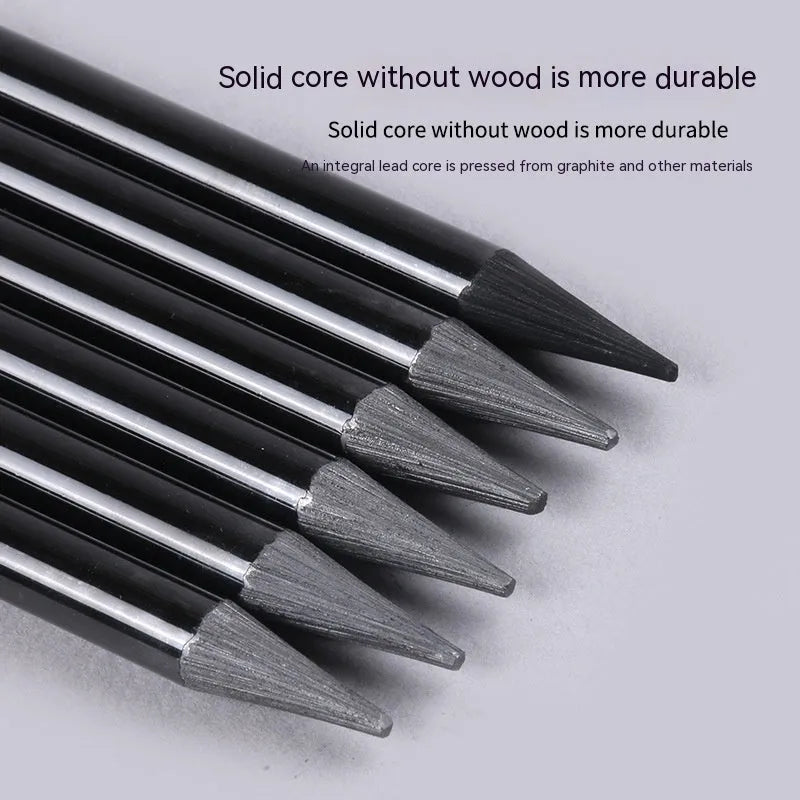 Set of nine art pencils on a card: six graphite pencils and three darker carbonized pencils in wooden casings.