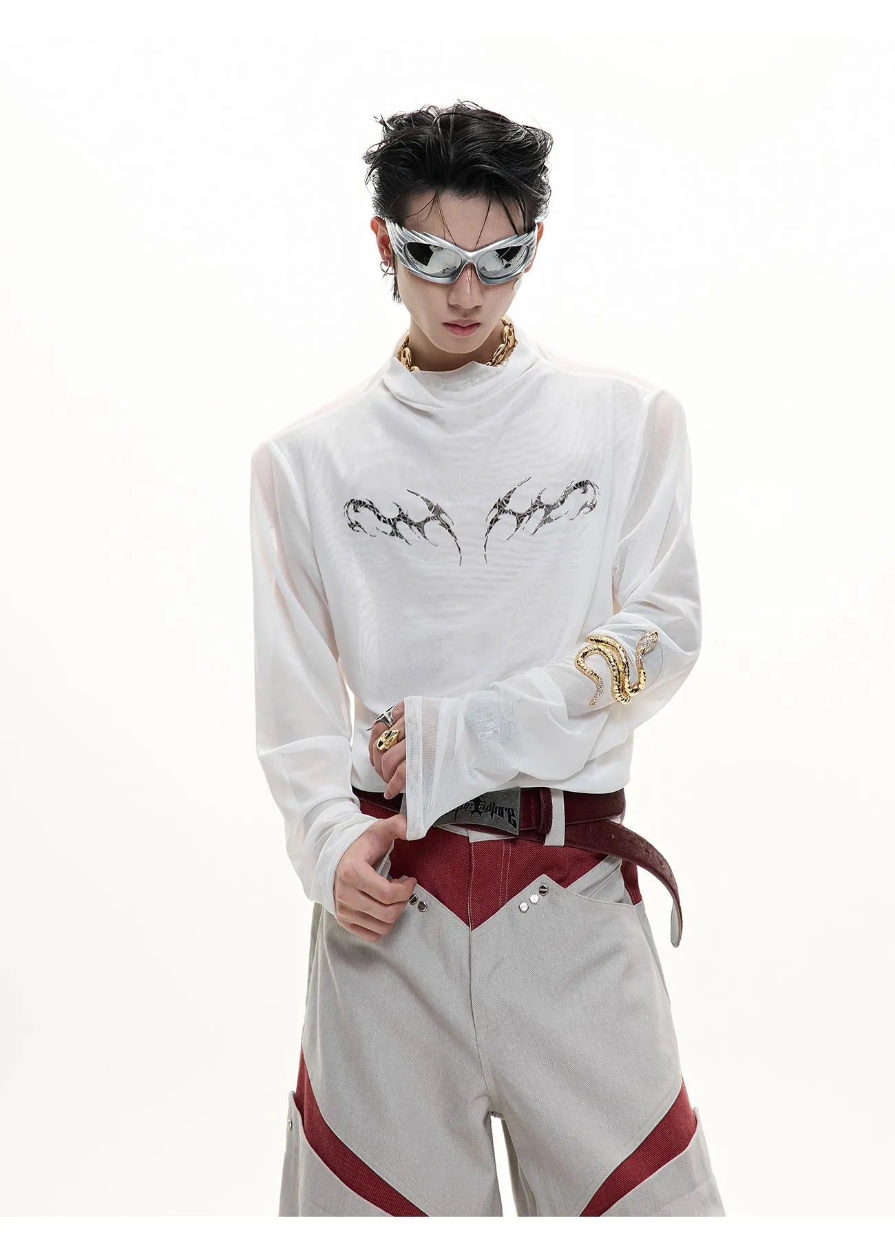 Black niche mesh slim-fit long sleeve bottoming shirt laid flat, showing trendy style and texture.