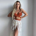 Three-piece backless push-up bikini set in creamy white colour with separate top, panties, and skirt components