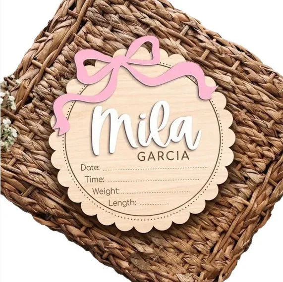 Square wooden baby room ornament with custom name text for wall decoration.