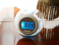 White colorful natural sound alarm clock with large LCD display and seven colour cycle light