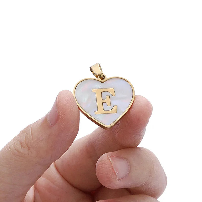 Gold-plated heart-shaped necklace with white shell pendant and personalised initial letter on 45+5cm chain