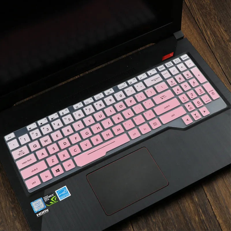 ASUS VivoBook 15 X513 laptop with a translucent mint coloured silicone keyboard protector fitted.