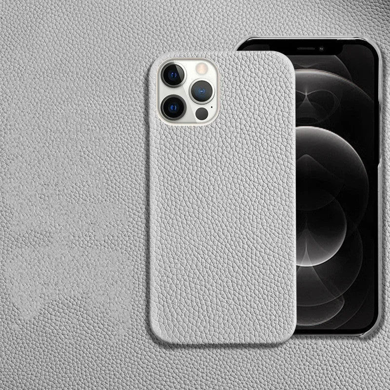 Brown genuine leather half-wrap protective case on an iPhone 14 Pro Max.
