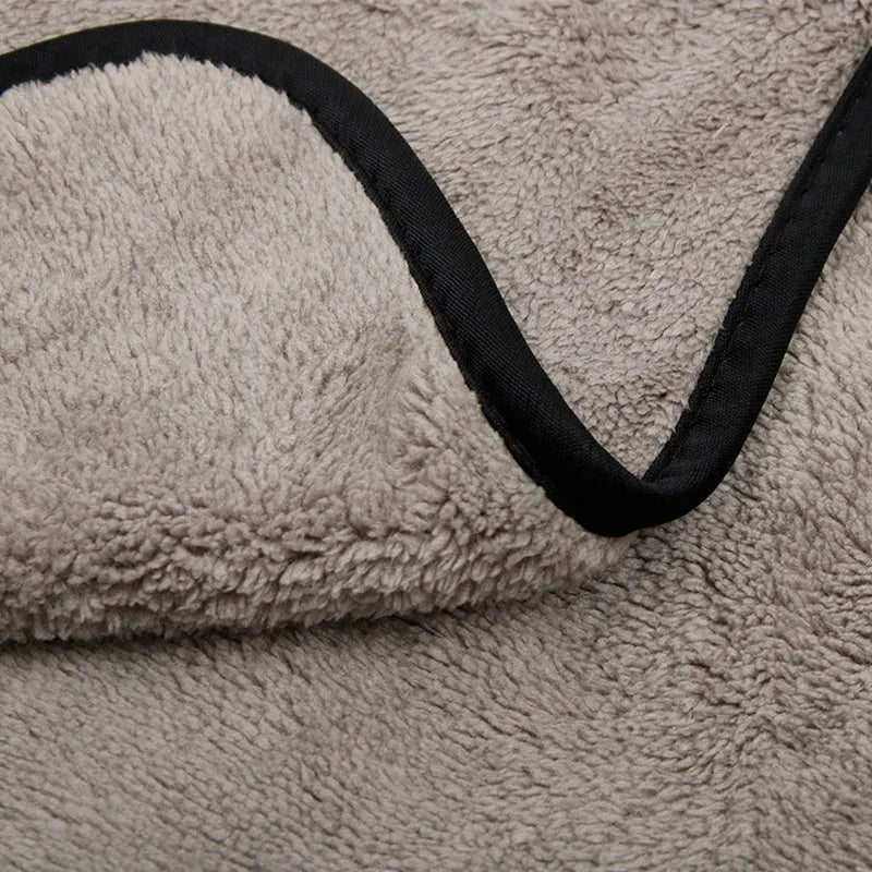 Three size options of a blue microfiber car wash and drying towel laid flat.