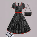 Women's multicolor polka dot dress with square collar, front zipper, and pleated skirt