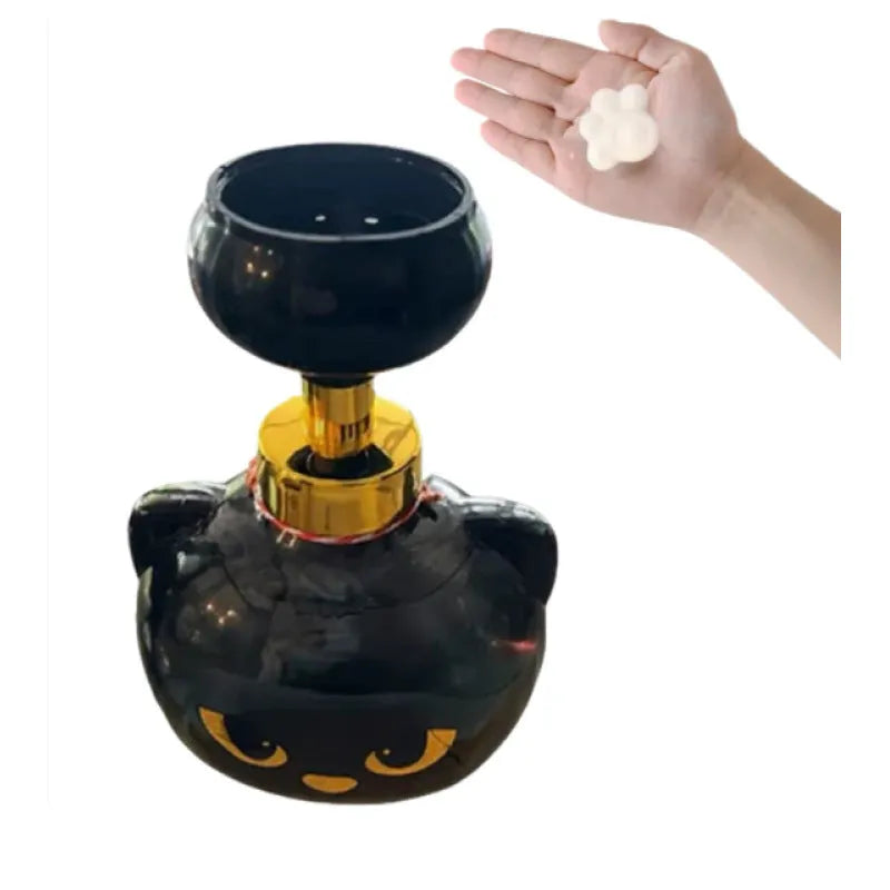 Black cartoon cat shaped plastic soap dispenser with manual pump, 10cm wide by 18cm high