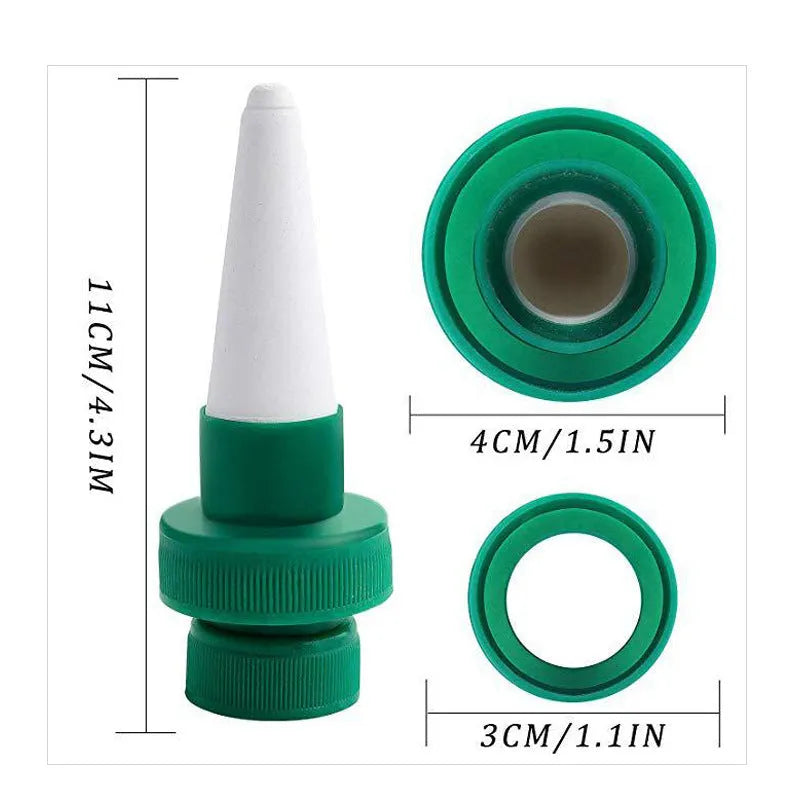 Green ceramic plant water dripper attached to cola bottle for automatic flower irrigation