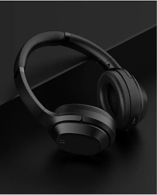 Black Gorsun E98 over-ear wireless Bluetooth headphones with memory-protein ear cushions and adjustable stainless steel headband.