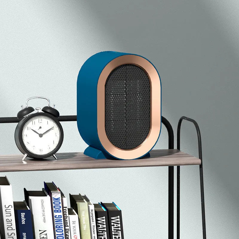 Desktop electric ceramic heater in portable fan design with mechanical controls