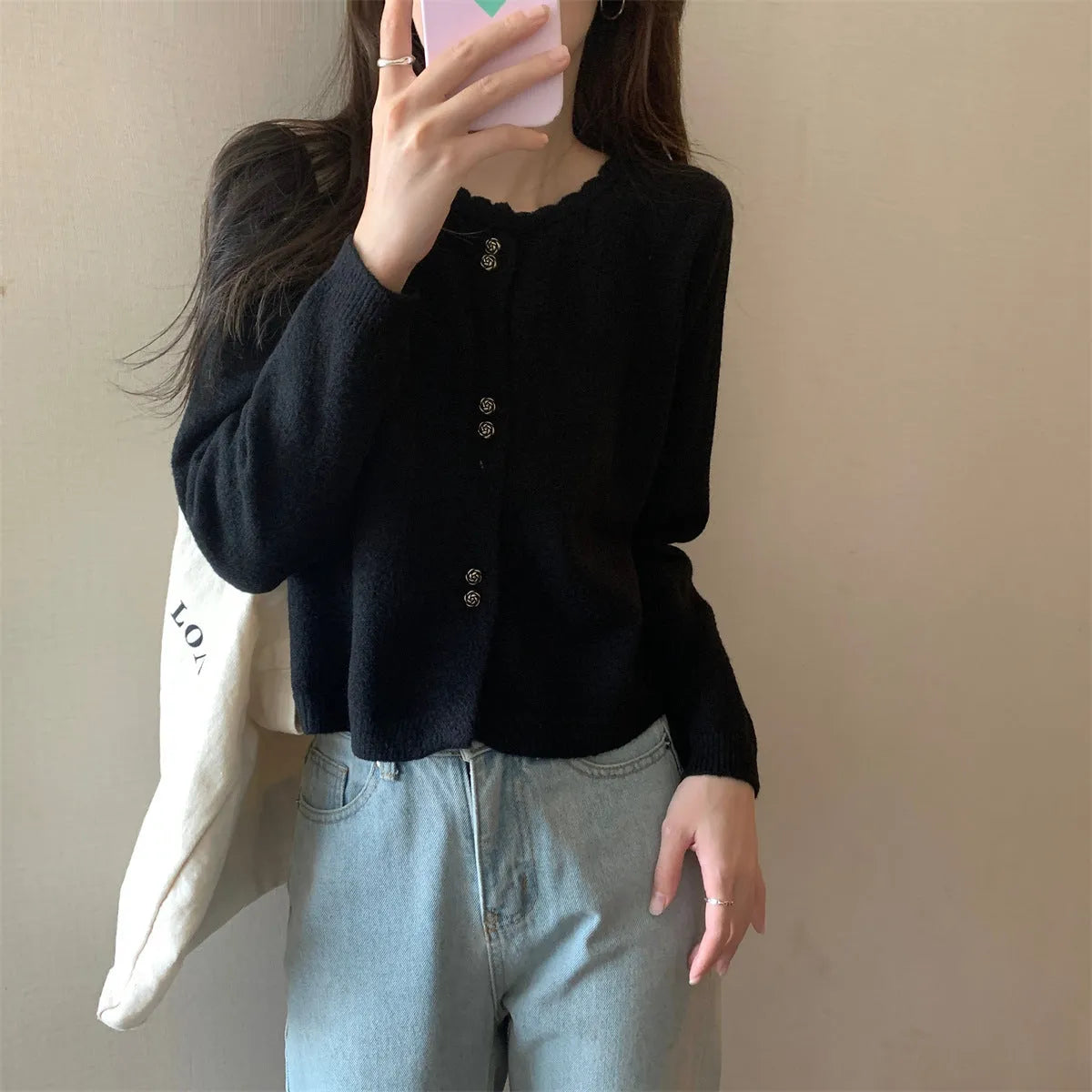 Women's long-sleeved acrylic fibre cardigan in milky white, shown open-front as a free-size layering piece.