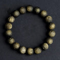 Natural obsidian crater ball bracelet with grinding texture in silver or gold meteorite finish