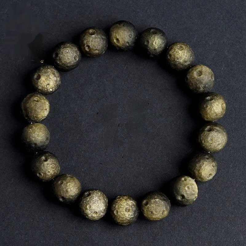 Natural obsidian crater ball bracelet with grinding texture in silver or gold meteorite finish