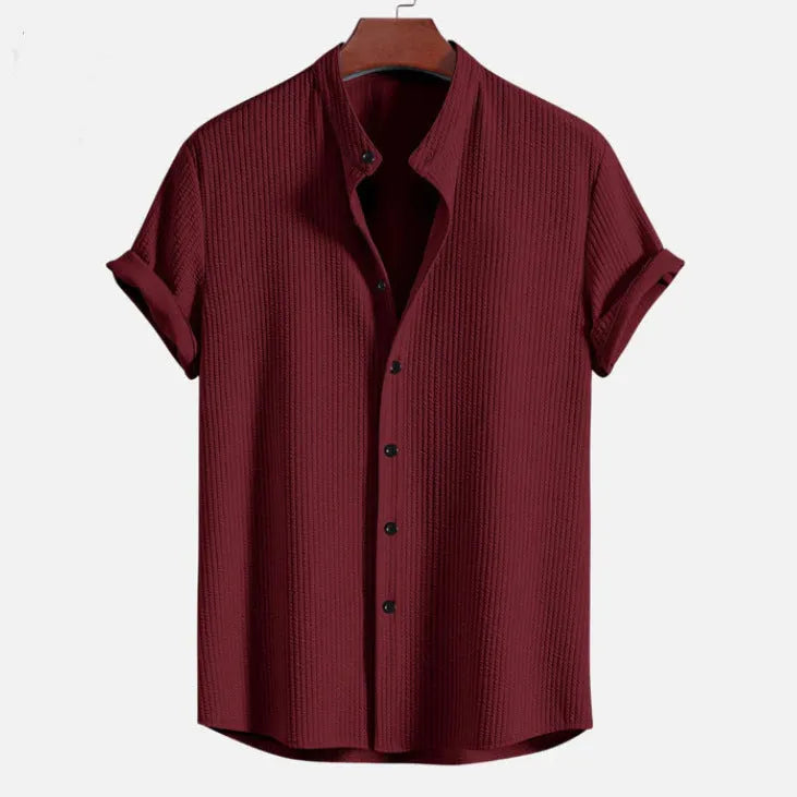 Men's short sleeve loose shirt in polyester fabric available in multiple colours including black, white and navy blue