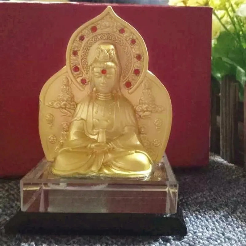 Traditional Chinese alloy prayer wheel car decoration on a dashboard