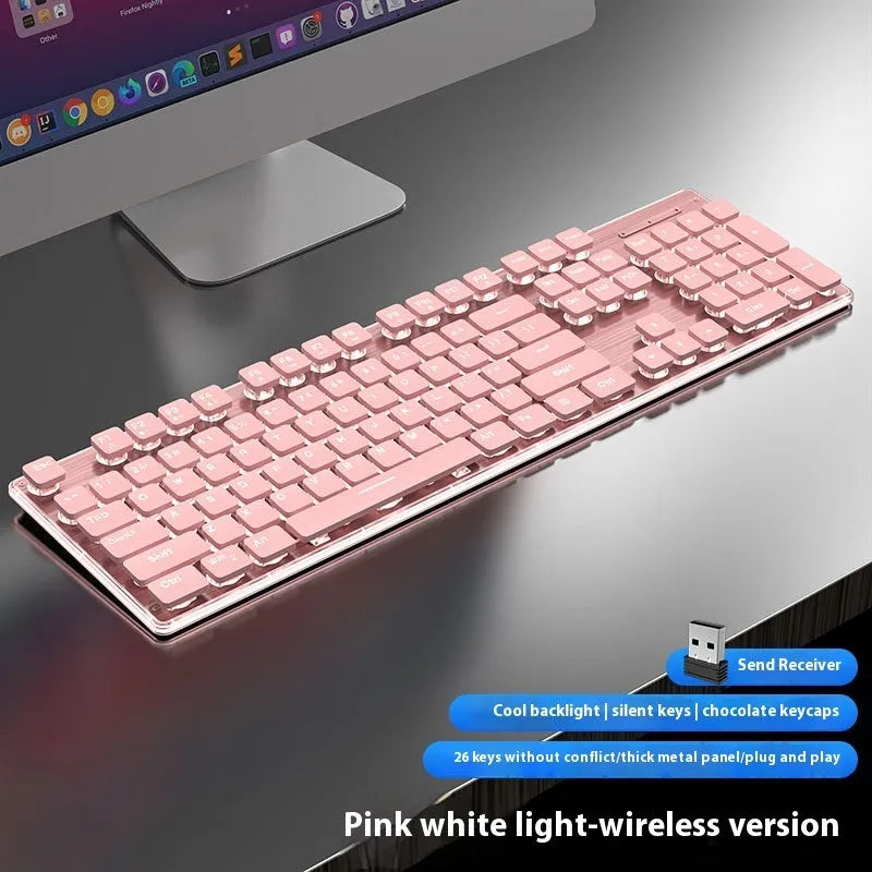 Wireless Bluetooth keyboard with mute button showing Cherry Blossom Pink backlight illumination