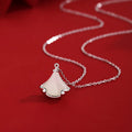 S925 sterling silver Hetian jade skirt pendant necklace on display with 40cm chain