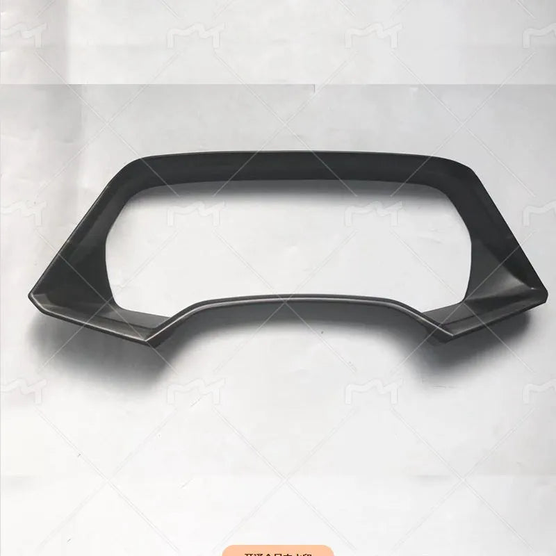BMW X5L dashboard decorative frame in carbon fibre and peach wood finishes