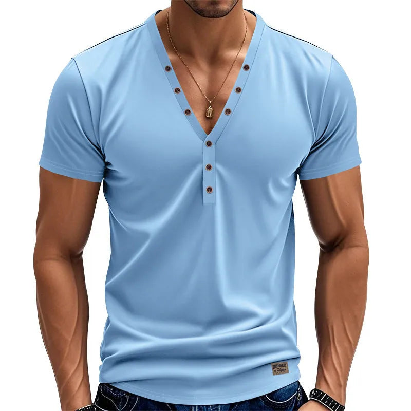 Man wearing a loose-fit grey V-neck button-front casual sports top.