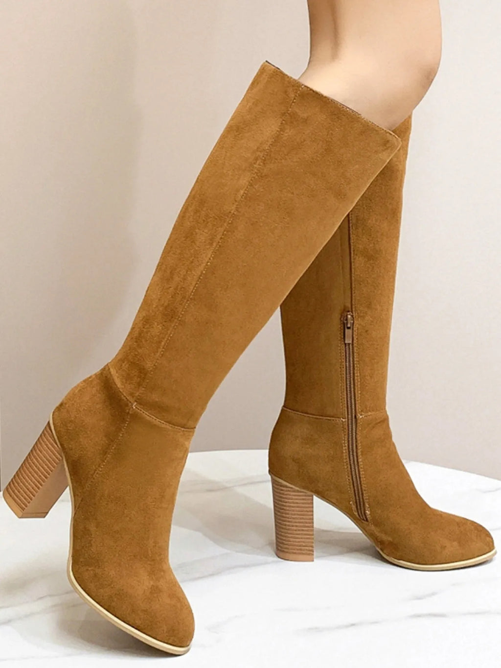 Women's black square toe high heel fashion boots made from artificial PU material