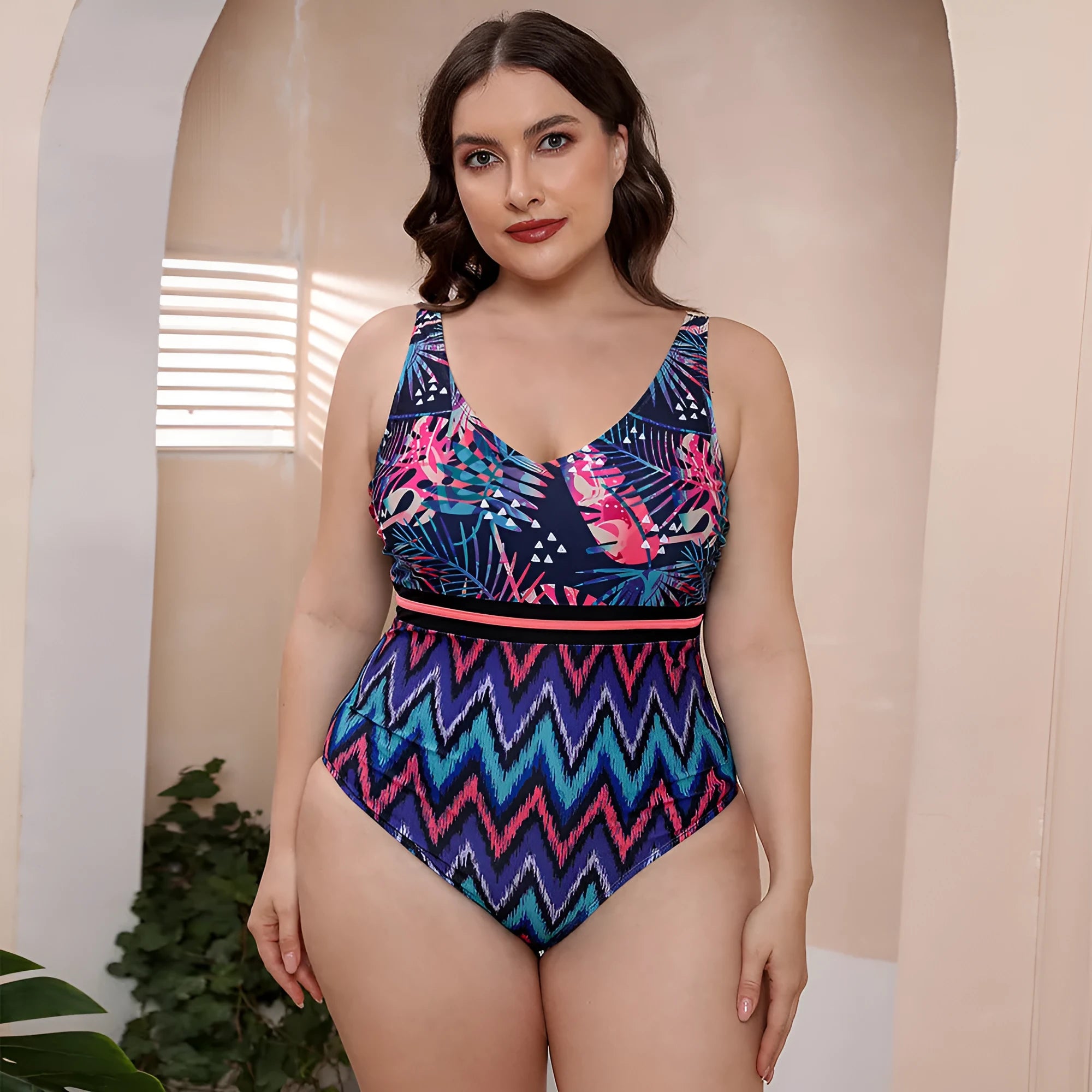 Women's blue striped vest print one-piece swimsuit with spaghetti straps on a mannequin.