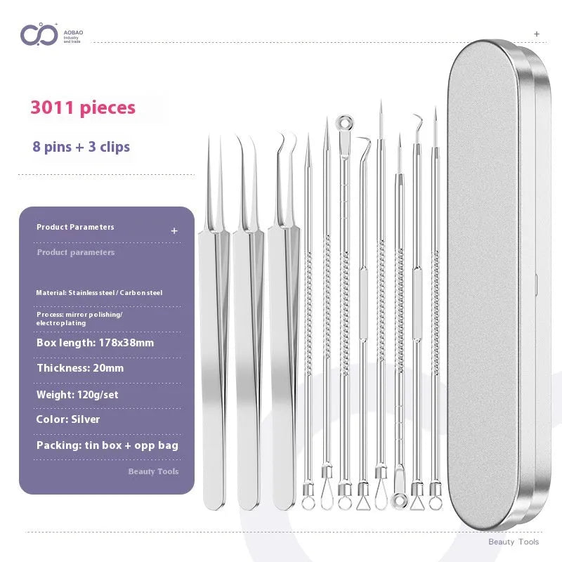 Four silver metal acne needles with pointed tips laid out on a surface.