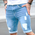 Sky blue distressed denim shorts with low-rise waist and zip fly closure