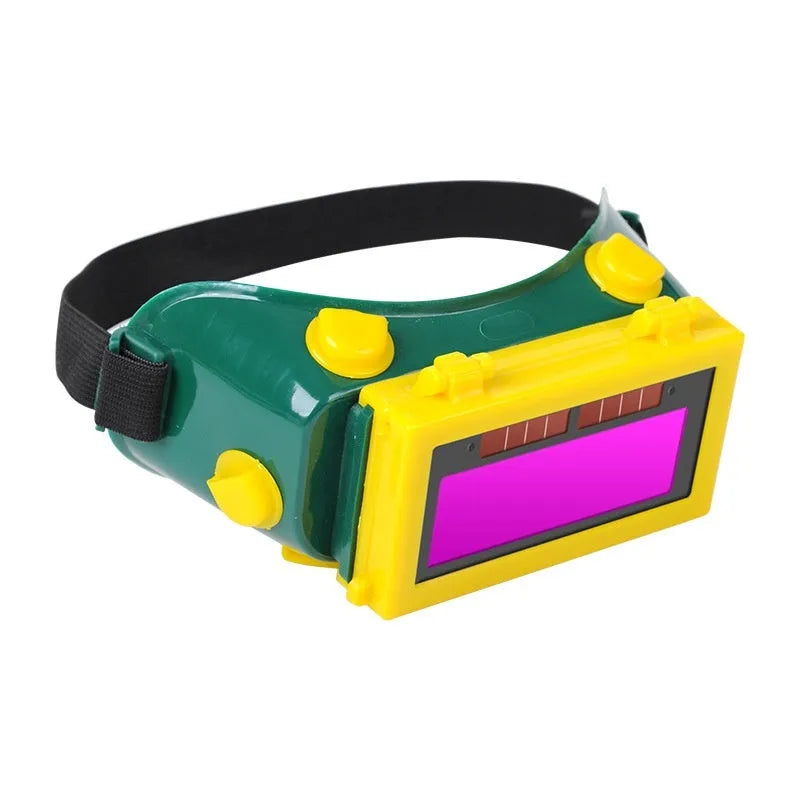 Green light-changing electric welding glasses with flip dimmer and PVC frame