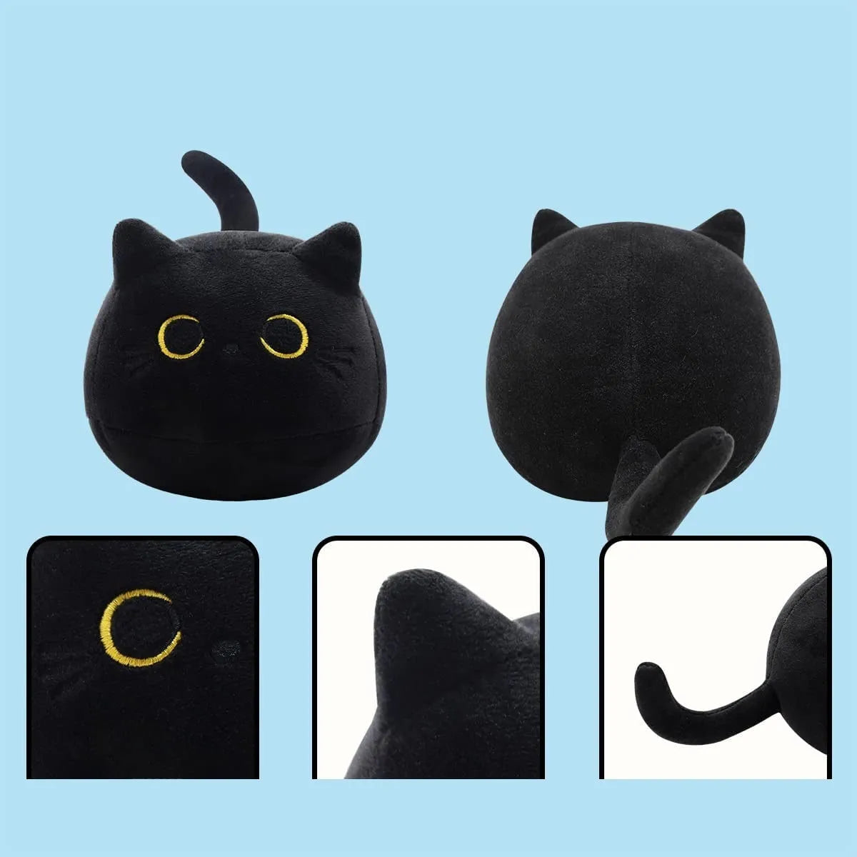 Fluffy black cat plush toy with embroidered face on a soft cushion