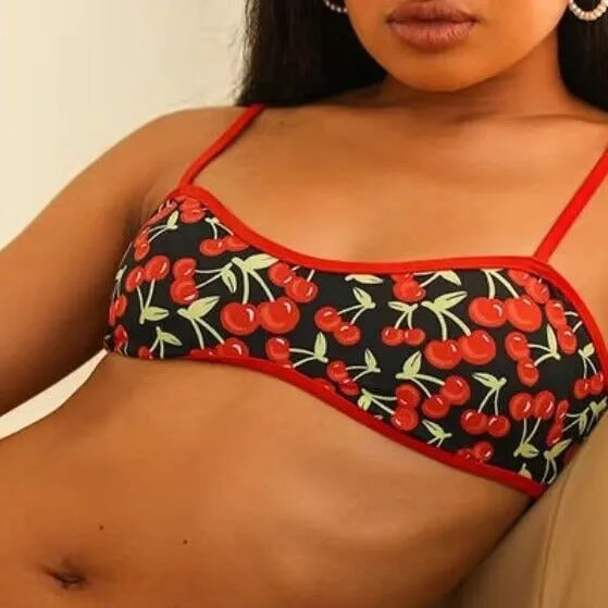 Women's cherry print floral tube top bikini swimsuit in polyester fabric.