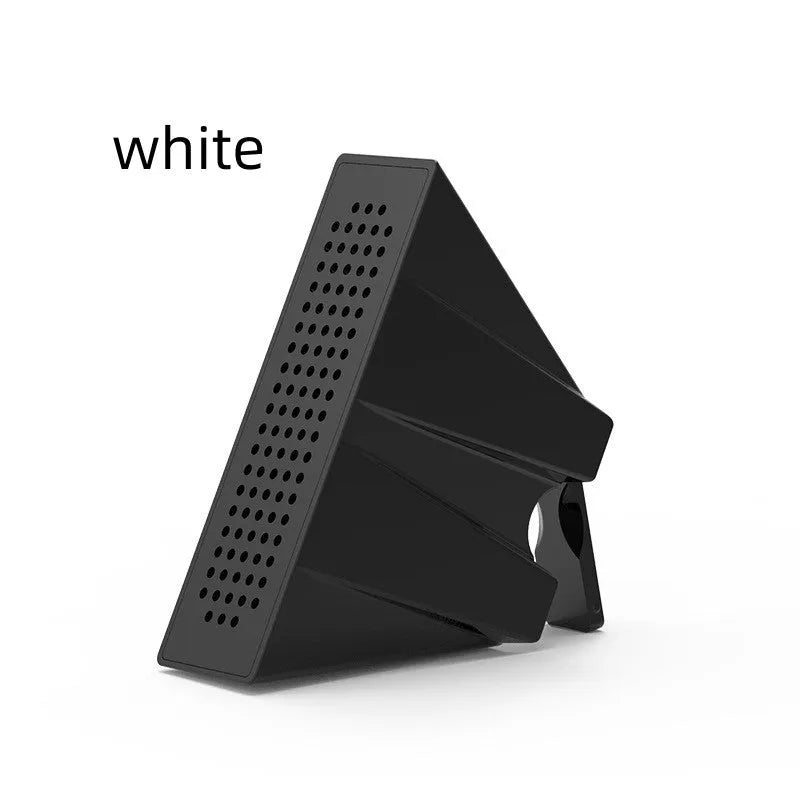 Mini black plastic phone amplifier bracket holding an Apple iPhone on a desktop