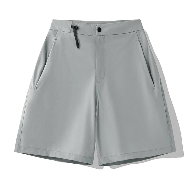 Men's quick-drying sports shorts in Army Green colour showing elastic fit and 3D cut for athletic movement.