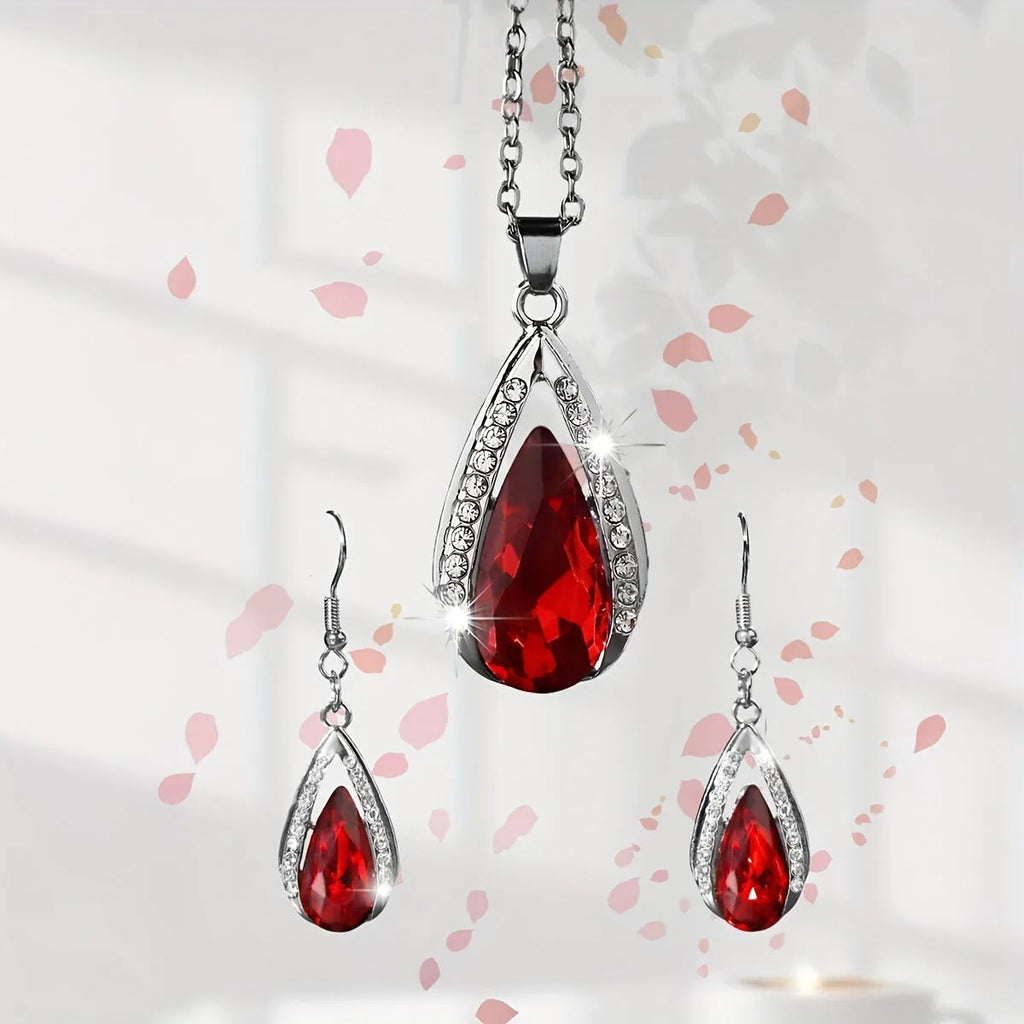 Teardrop glass pendant necklace and matching earrings set in black or red alloy jewellery