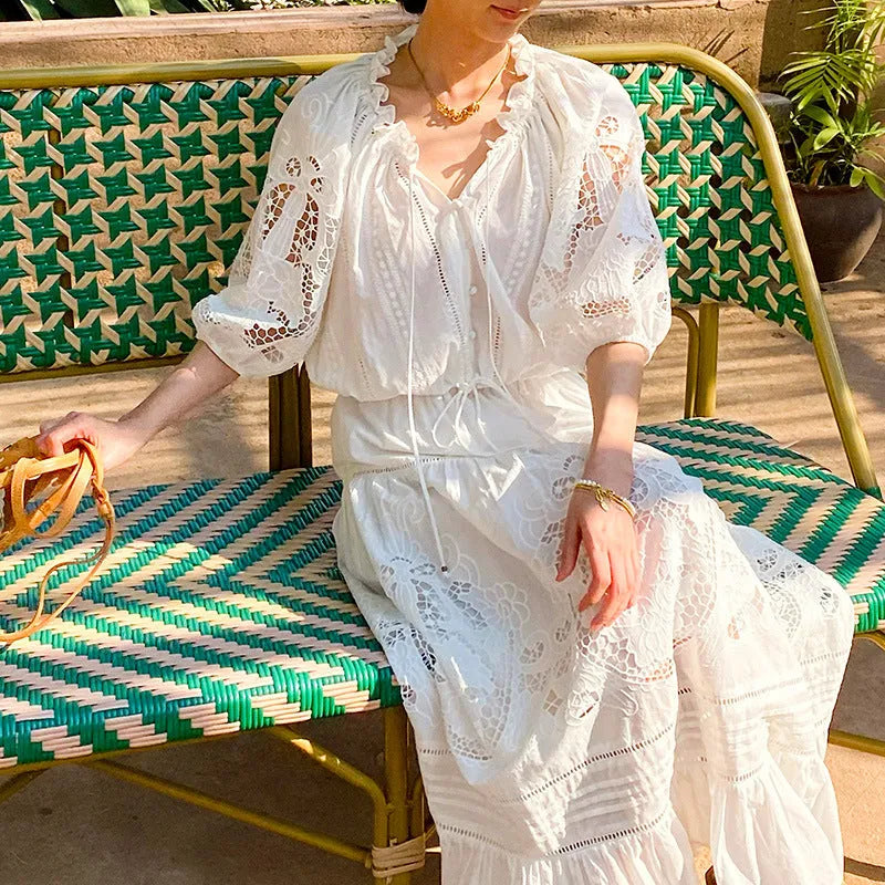 Women's white floral cotton two-piece set with embroidered sleeveless top and midi skirt