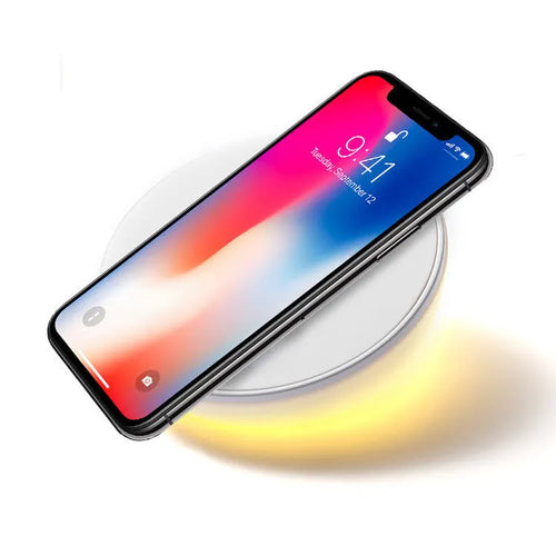 White 10W wireless charging pad with digital clock display and three control buttons