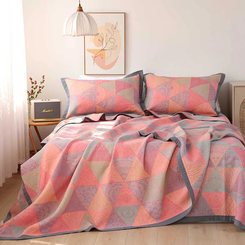 Cotton gauze bed blanket three-piece set with floral pattern showing blanket and two pillowcases