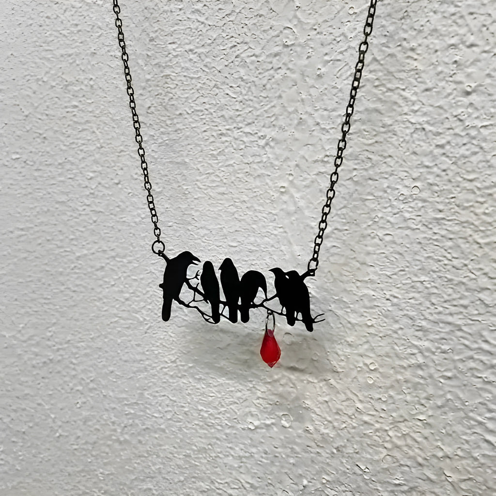 Black crow necklace with bird zodiac pendant on cross chain for women's alternative fashion jewellery