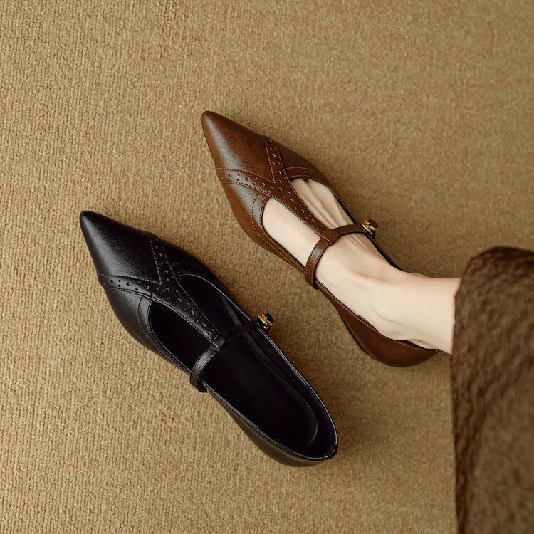 Brown women's cowhide leather low-cut flat shoes with a round toe and soft bottom.