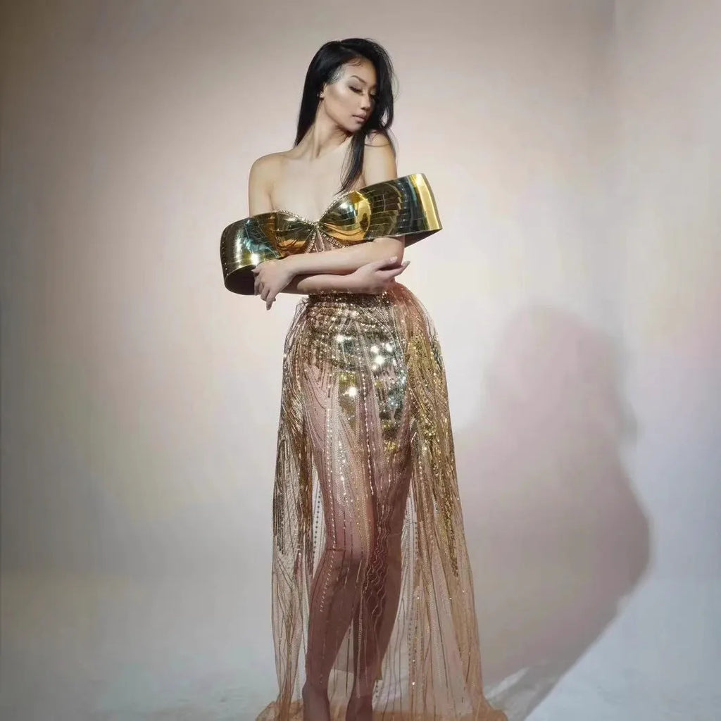 Gold strapless sequined evening dress with tulle accents and side split skirt