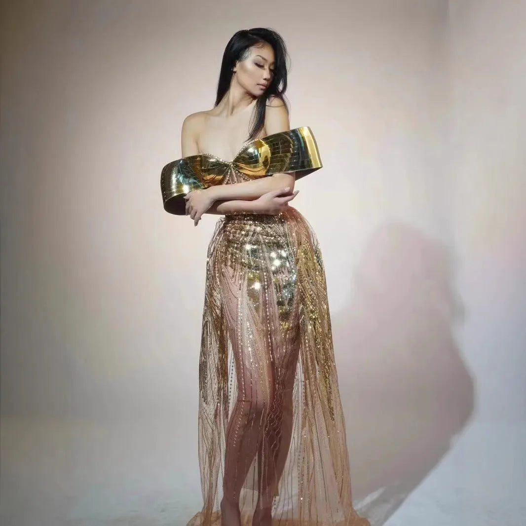 Gold strapless sequined evening dress with tulle accents and side split skirt