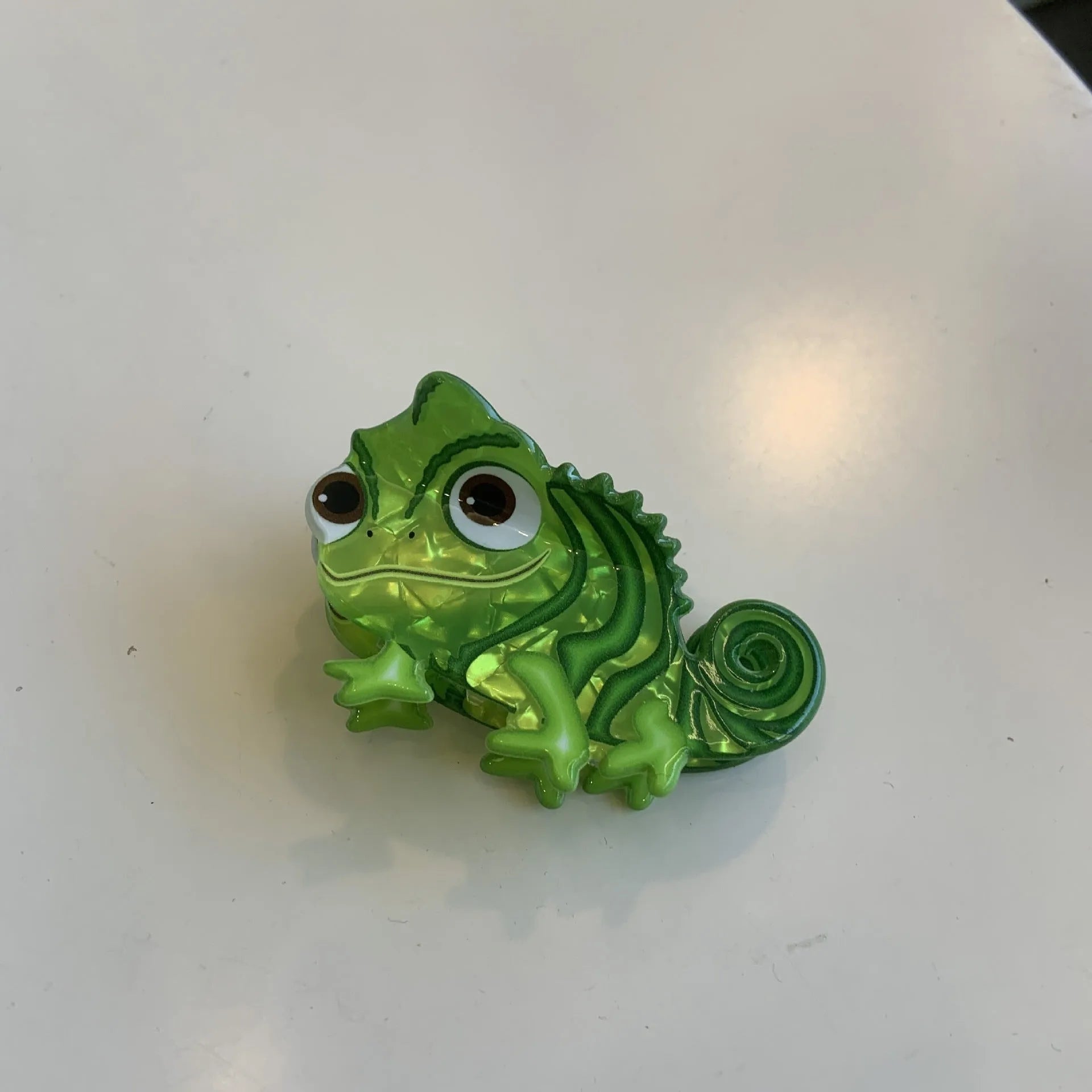 Acrylic dinosaur-themed hair clip with jaw grip design in one of six colour variations