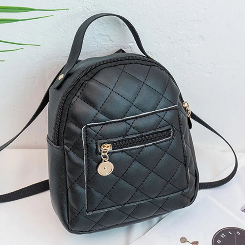 Girls' Korean style embroidered hard backpack in black colour showing sandwich pocket and soft handle
