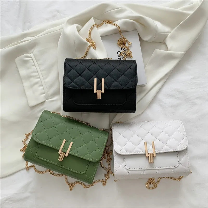 Women's diamond lattice chain crossbody bag in black, white, or green with adjustable strap