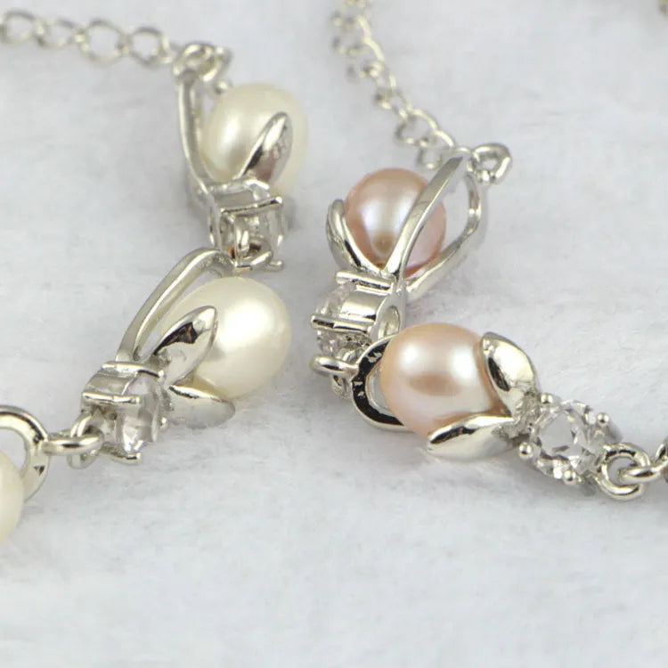 Freshwater pearl bracelet with Korean crown design on white background