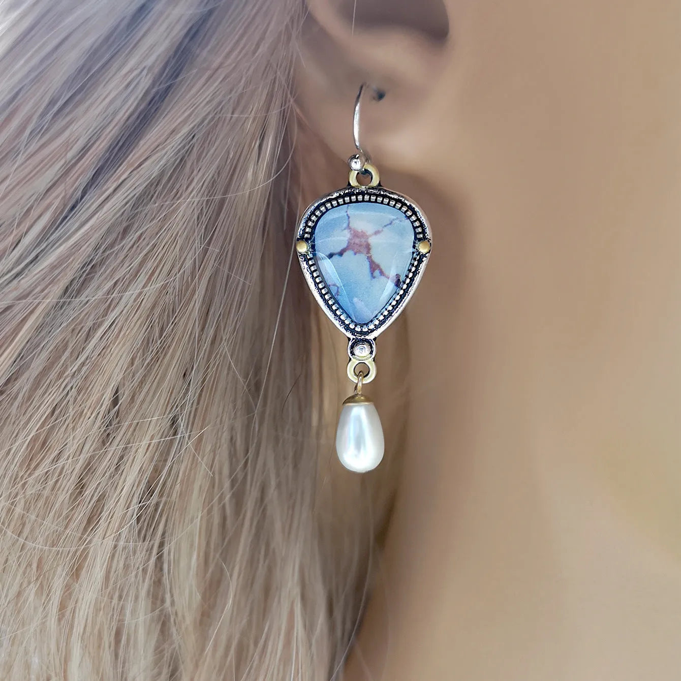 Retro blue geometric drop earrings with synthetic blue opal and white pearl on electroplated metal.