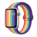 Silicone sports wristband with single buckle strap in black rainbow or white colour options