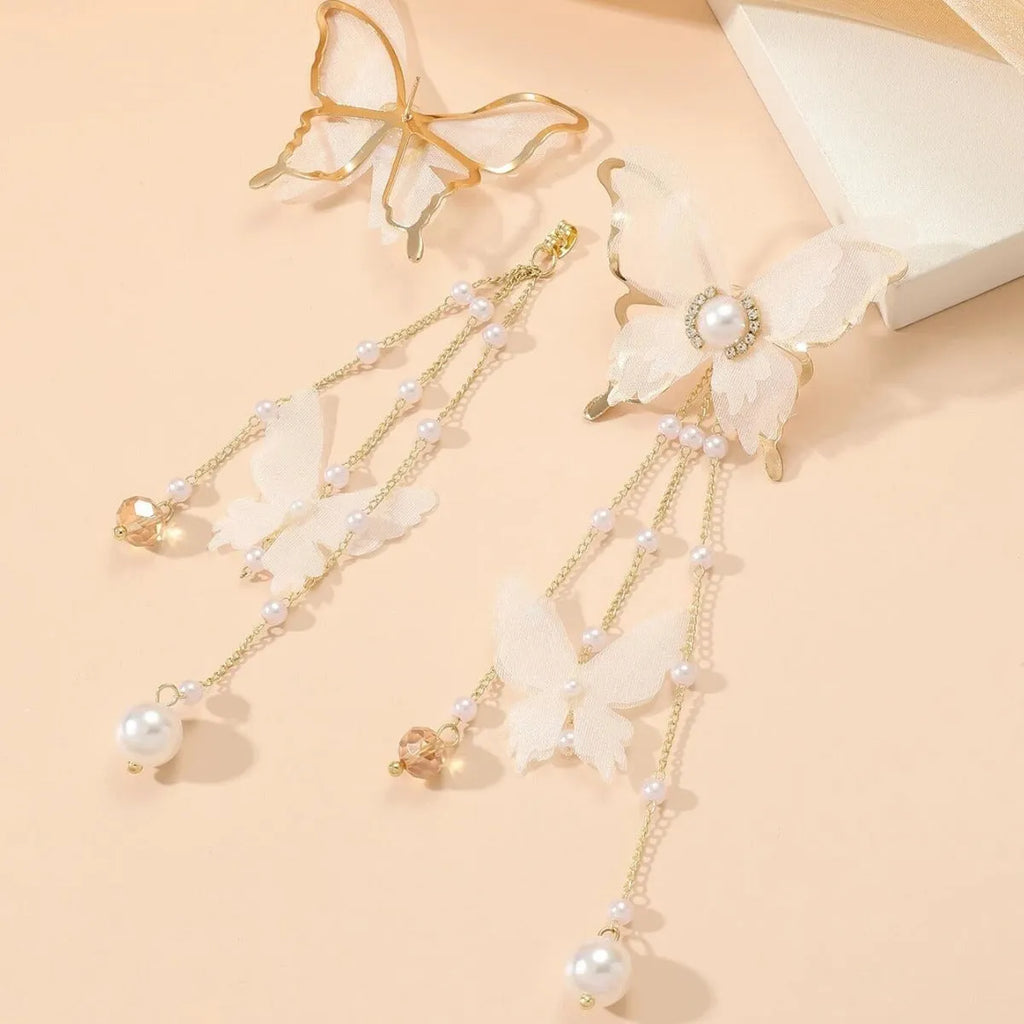 Women's white butterfly earrings with tassel design, lace pattern, and pearl rhinestone accents on electroplated copper alloy