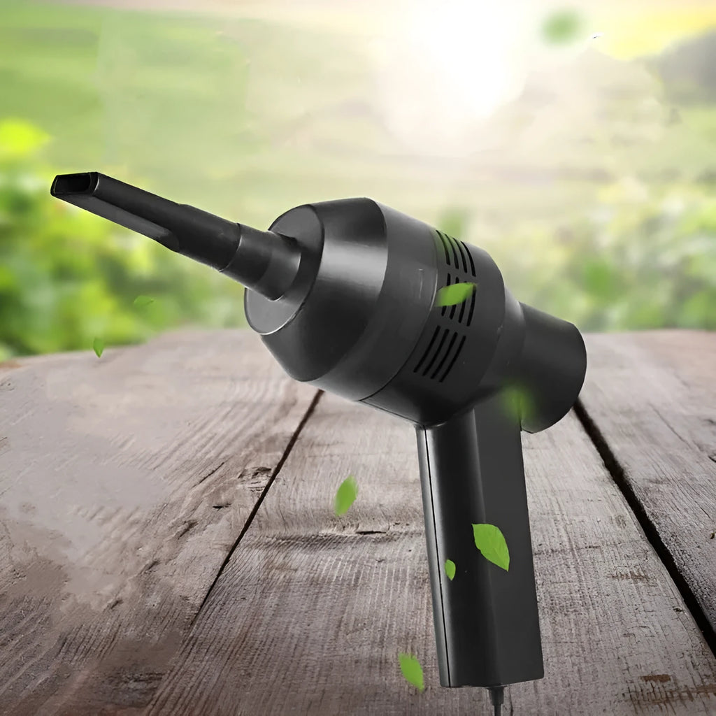 Black desktop mini vacuum cleaner with 4W power rating on a desk surface