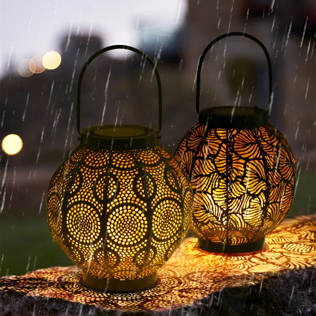 Solar-powered decorative iron courtyard lamp with hollow design for outdoor garden use