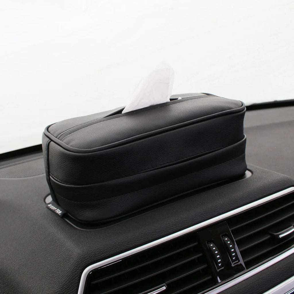 Black leather hanging organiser bag with zip and two loops, shown next to a beige version.